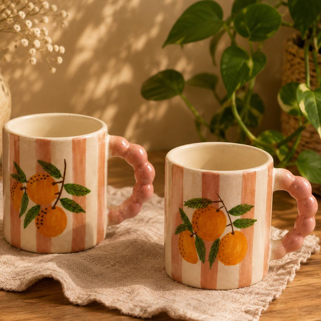 Peach Blossom Duo, handmade ceramic mug in orange