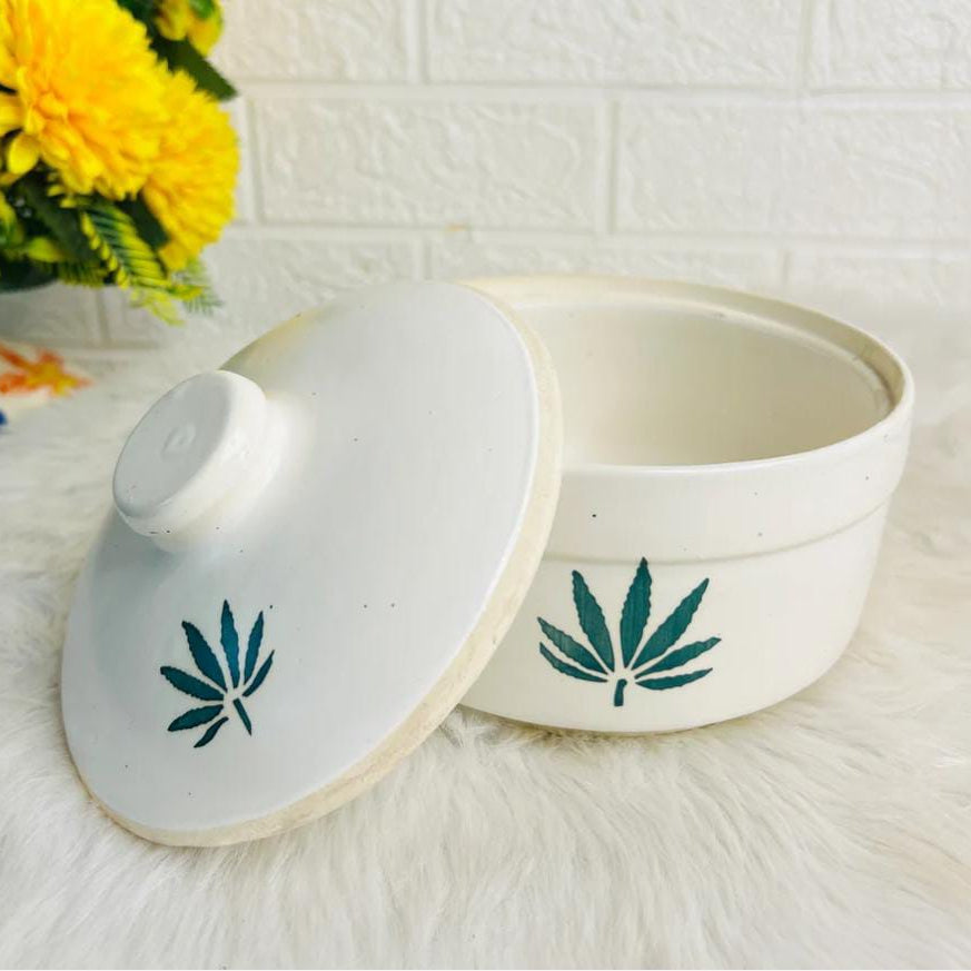 white green leaf jar