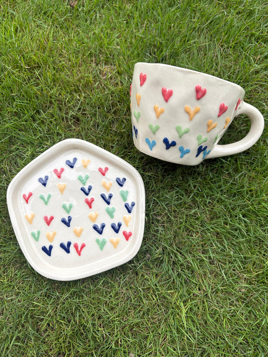 multicolor heart cup and saucer
